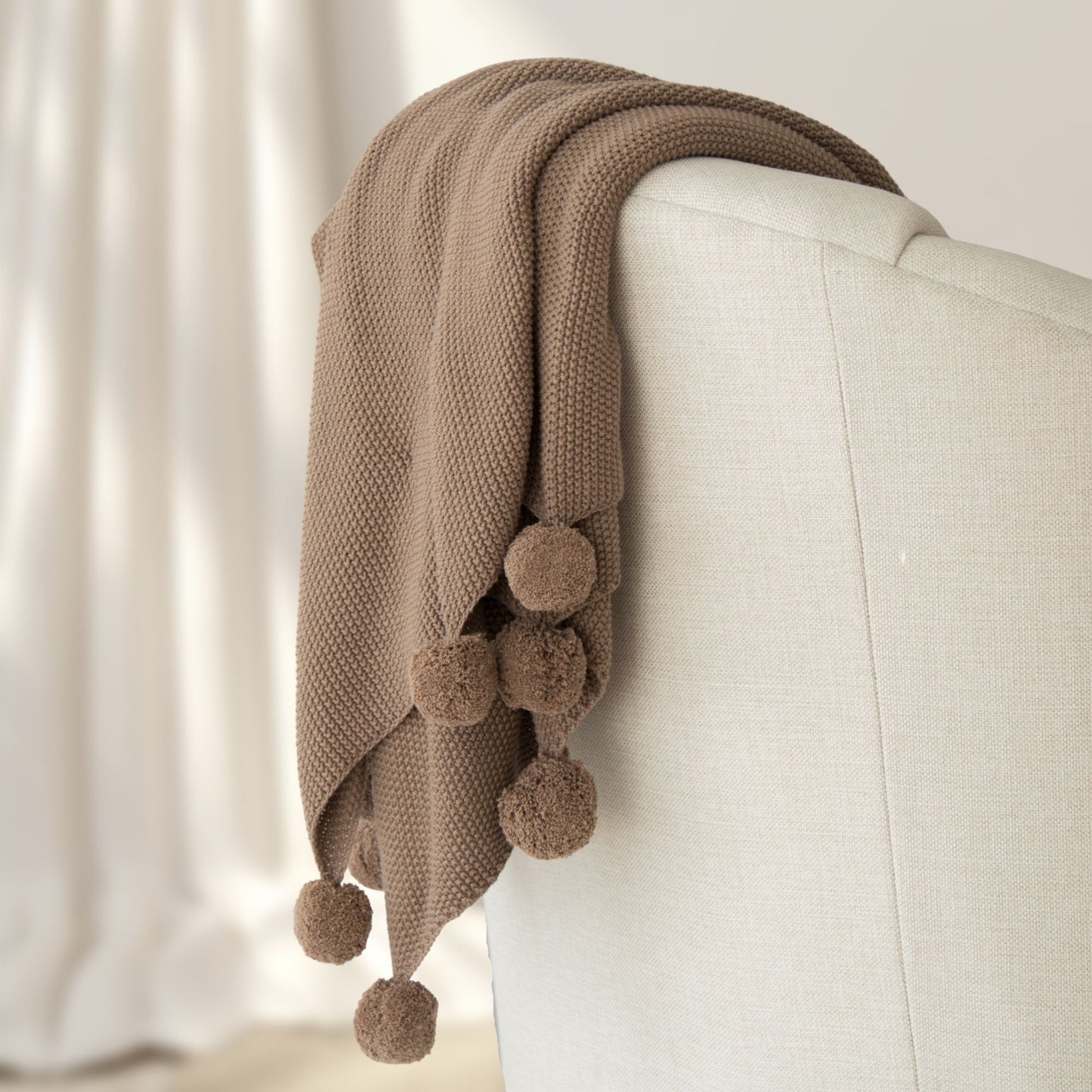 Aria Cotton Seedstitch Throw with Pompoms in Mushroom